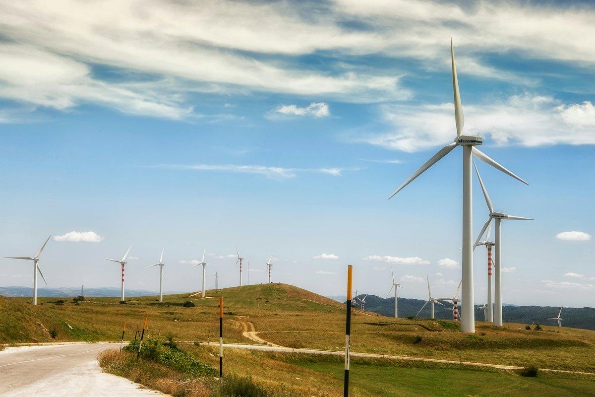 Wind turbines on green hills